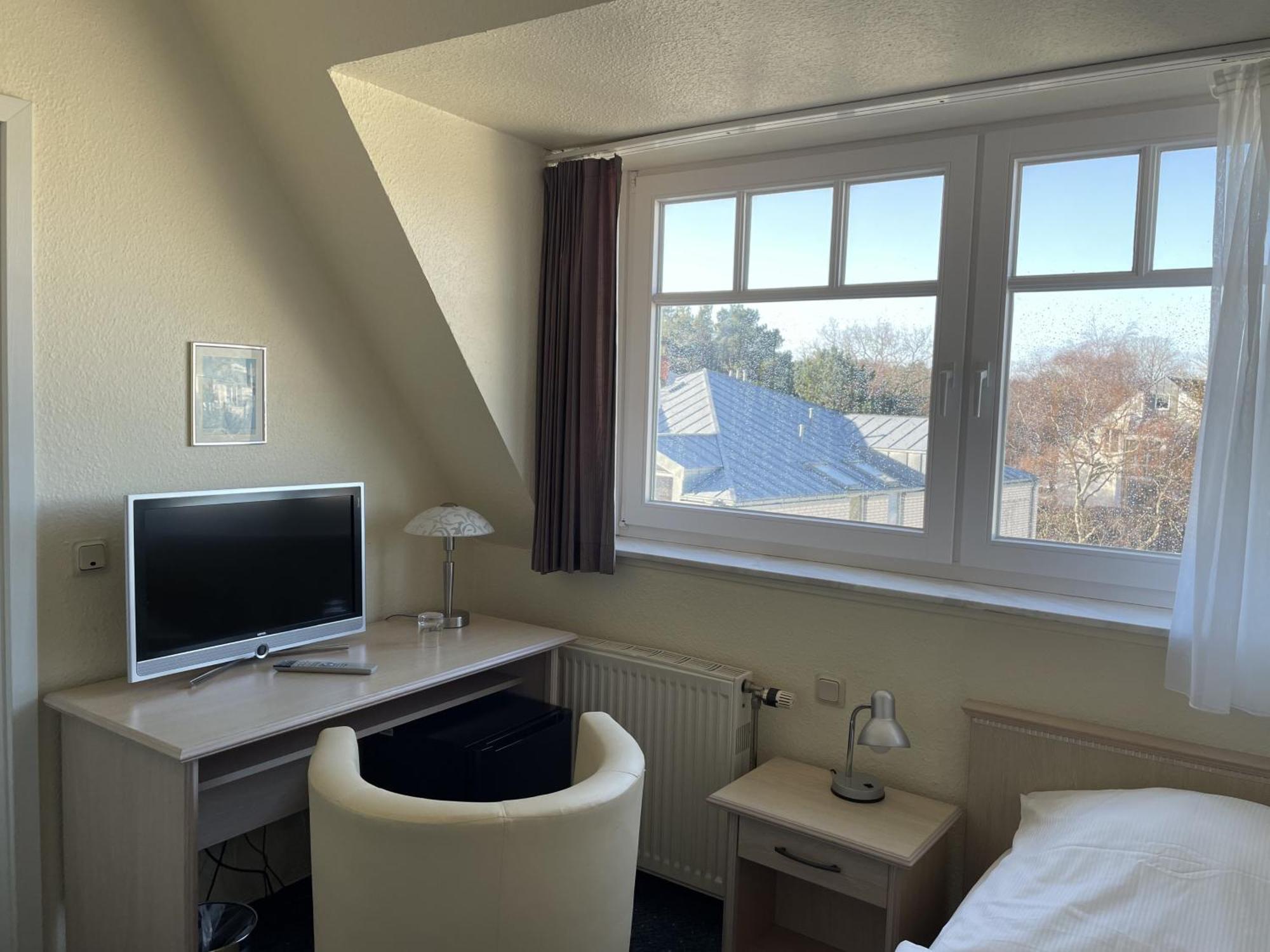 Strandhotel Duenenhaus Юлиусрух Экстерьер фото
